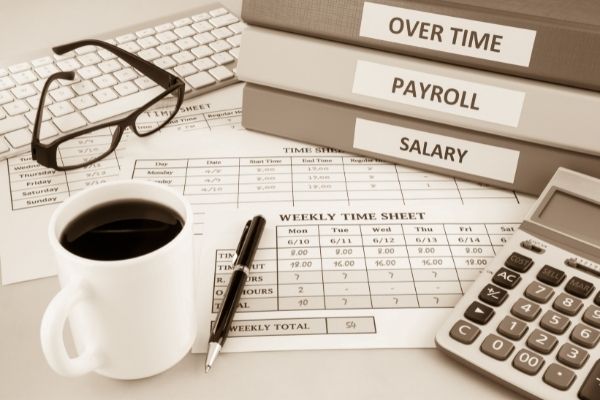 files showing overtime, payroll and salary | payroll outsourcing australia | Numera